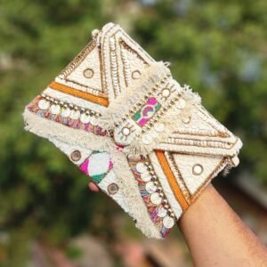 Banjara sling cum clutch