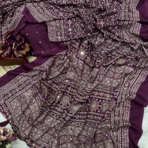 Soft crepe silk with Beautiful Ajarakh print with Zari and Real mirror work